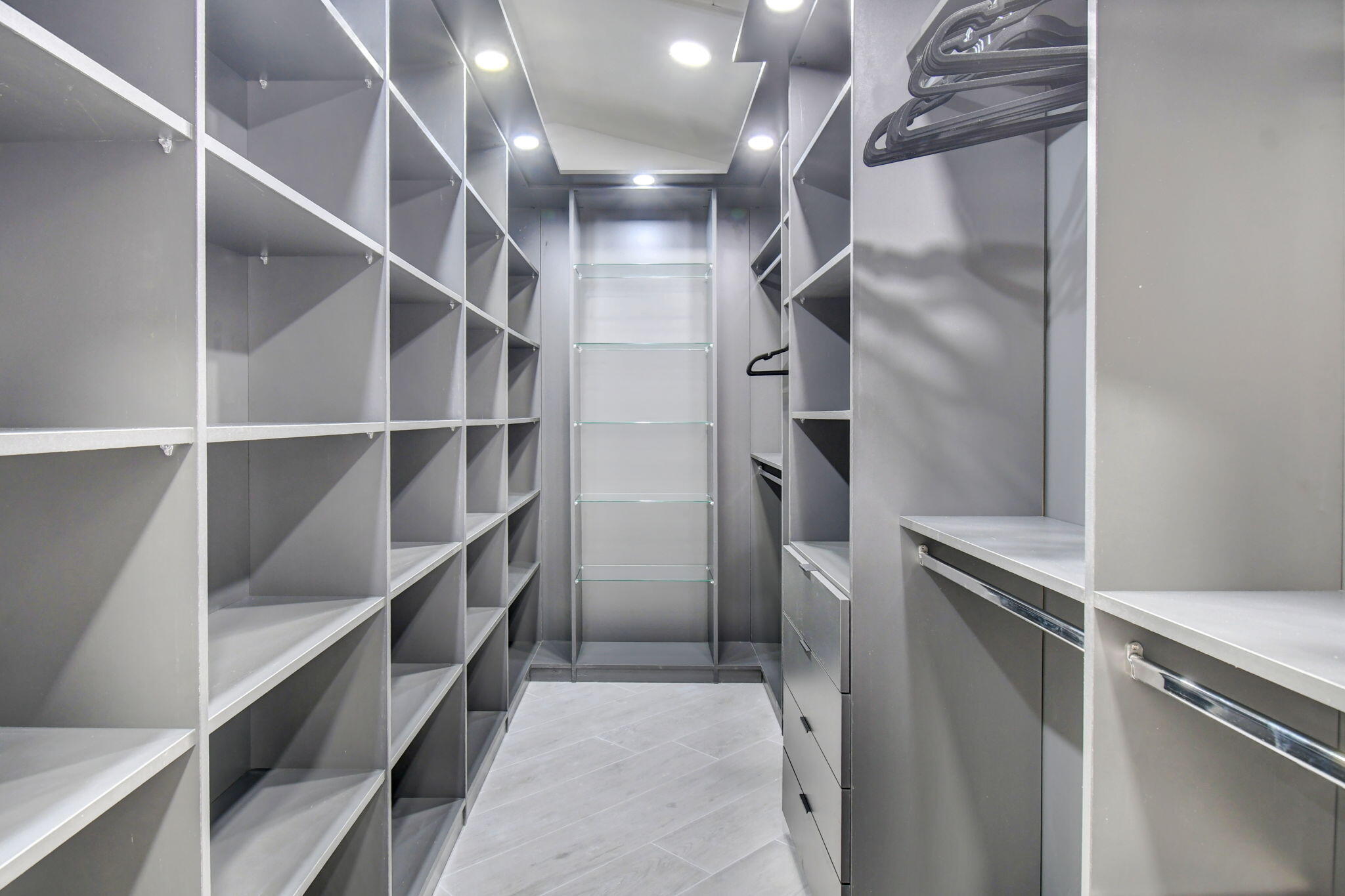 13302 Doubletree Circle Wellington, FL 33414 - Photo 34 of 82 a view of walk in closet with empty racks