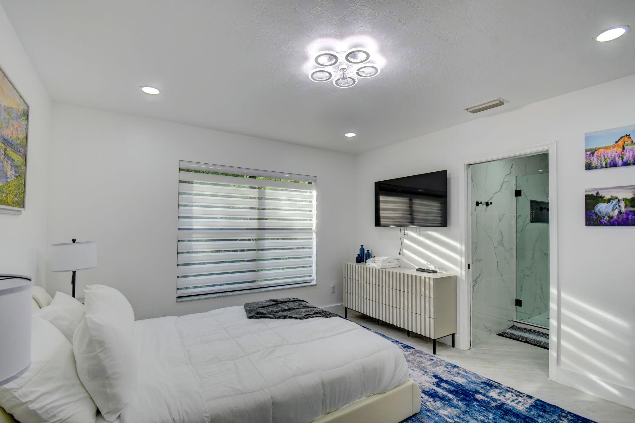 13302 Doubletree Circle Wellington, FL 33414 - Photo 39 of 82 a bedroom with a bed and furniture