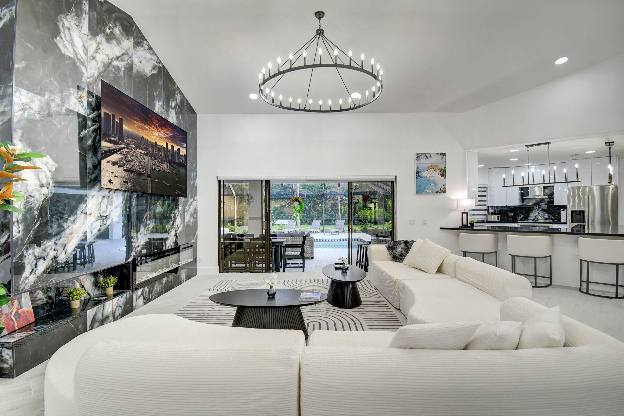 13302 Doubletree Circle Wellington, FL 33414 - Photo 5 of 82 a living room with furniture a flat screen tv and a large window