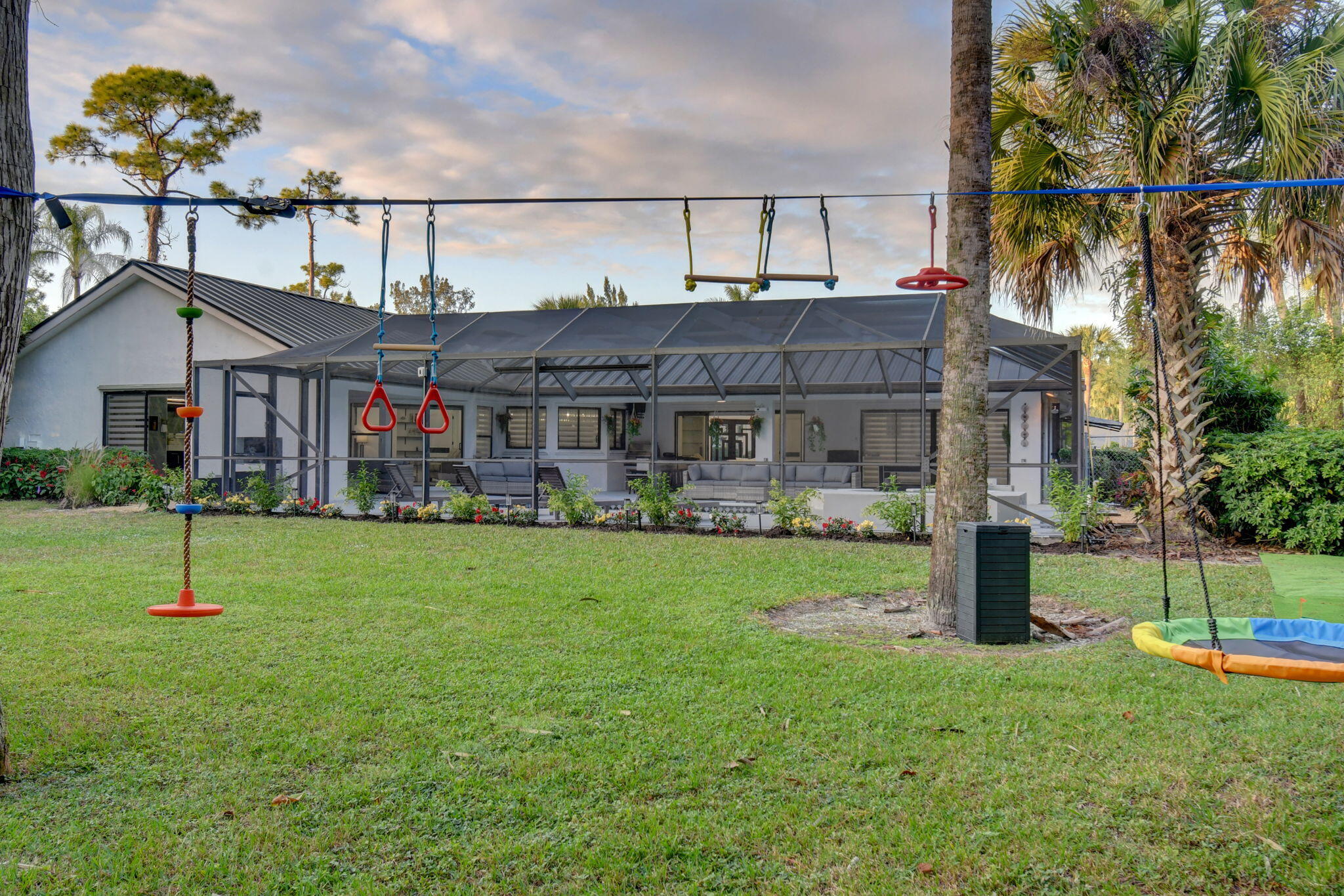 13302 Doubletree Circle Wellington, FL 33414 - Photo 62 of 82 a house view with a garden space
