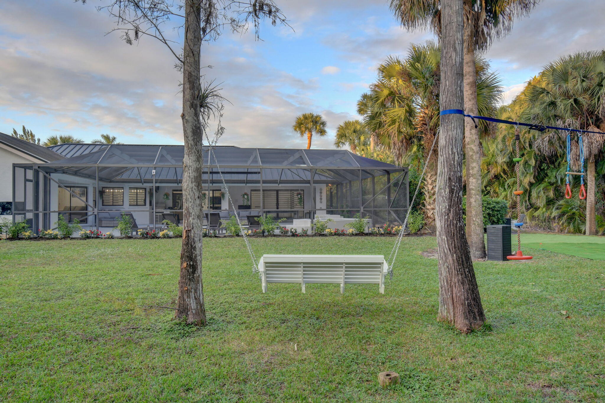 13302 Doubletree Circle Wellington, FL 33414 - Photo 63 of 82 a front view of a house with a yard