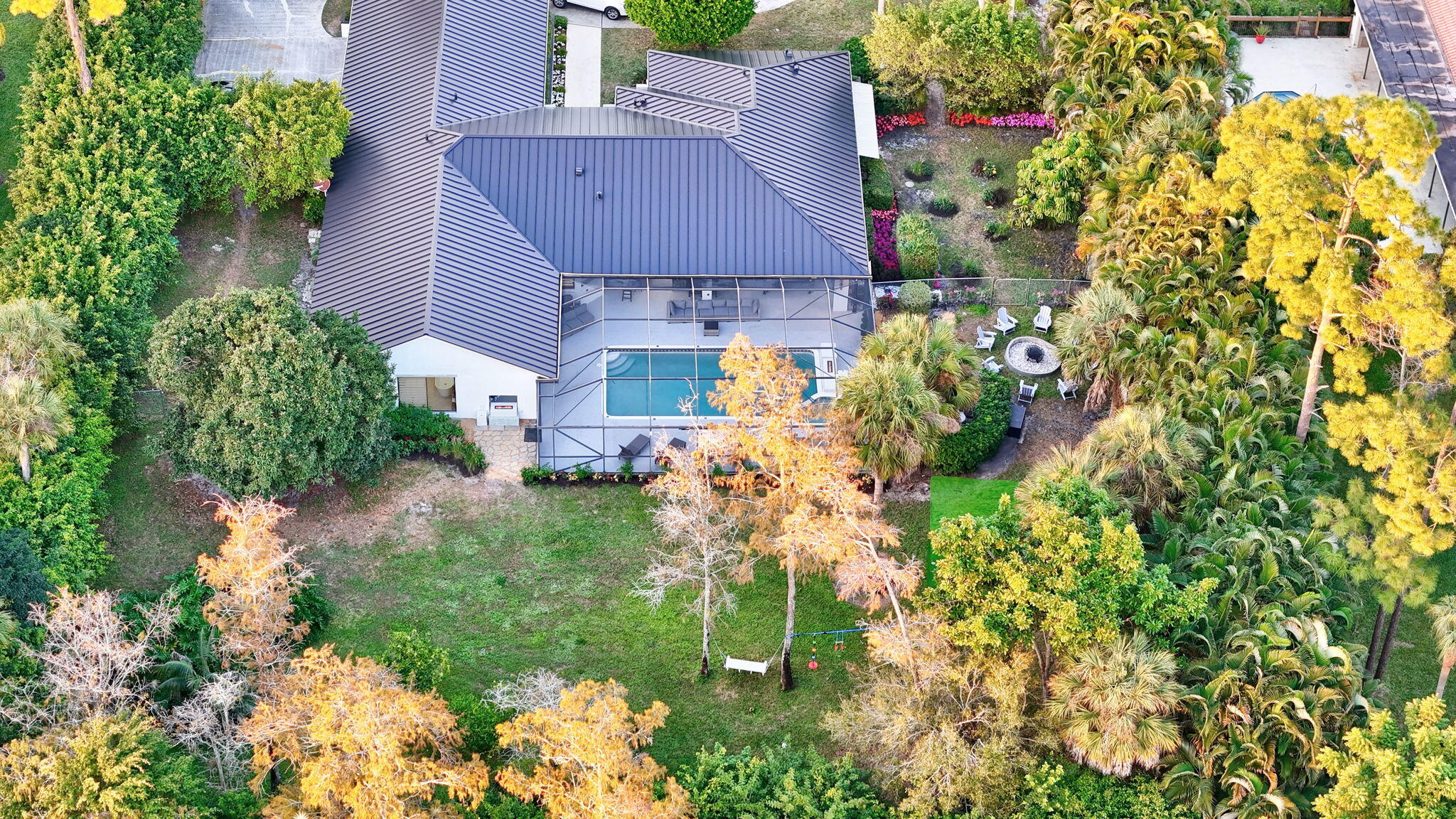 13302 Doubletree Circle Wellington, FL 33414 - Photo 77 of 82 a aerial view of a house with a yard and garden