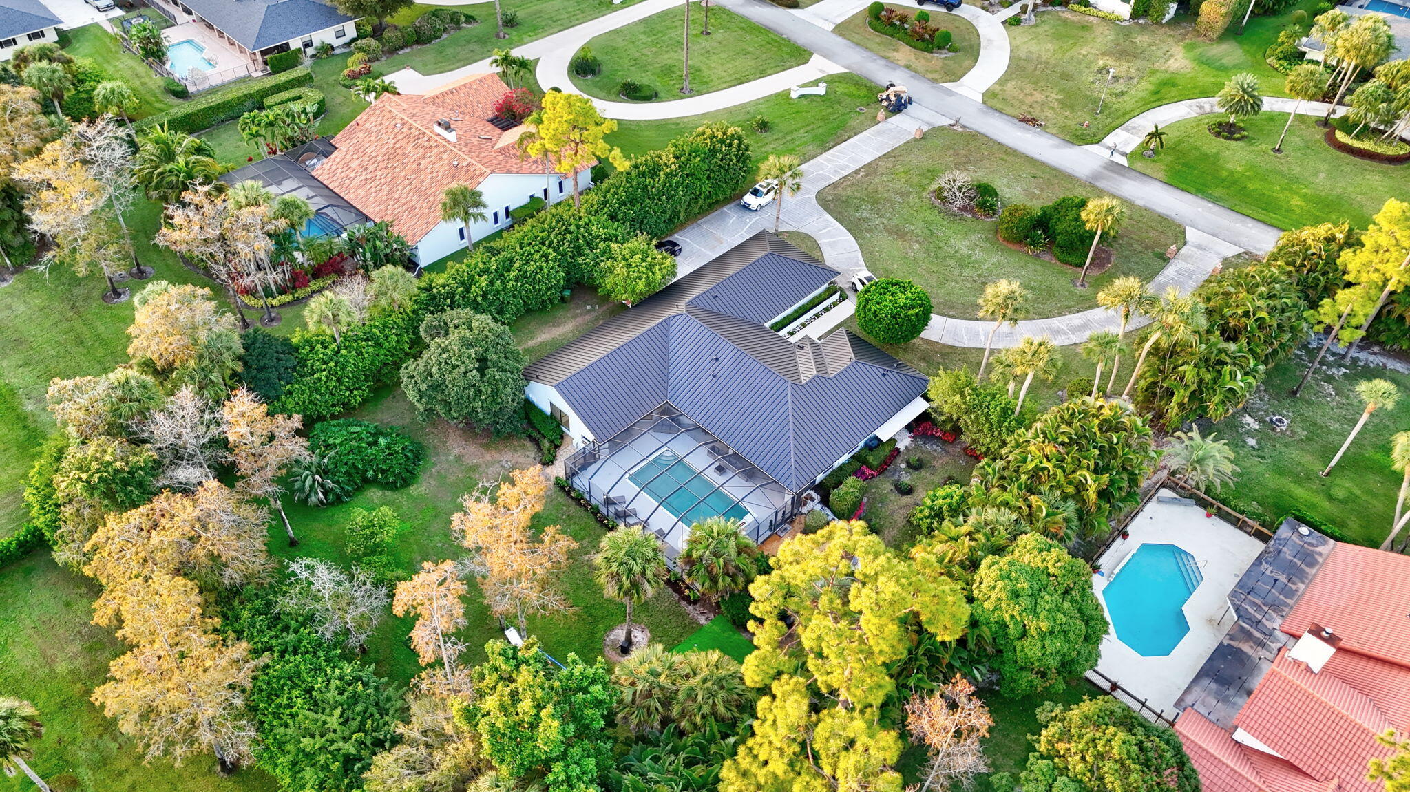 13302 Doubletree Circle Wellington, FL 33414 - Photo 78 of 82 an aerial view of a house with a yard swimming pool