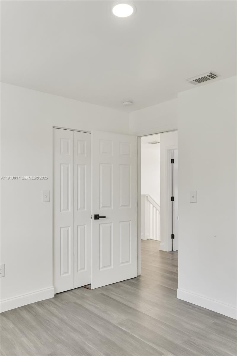 15309 Southwest 183rd Terrace Miami, FL 33187 - Photo 25 of 30 a view of a livingroom with wooden floor