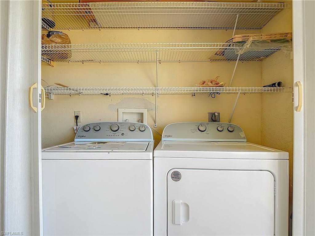 5635 Rattlesnake Hammock Road, Unit D203 Naples, FL 34113 - Photo 18 of 23 laundry