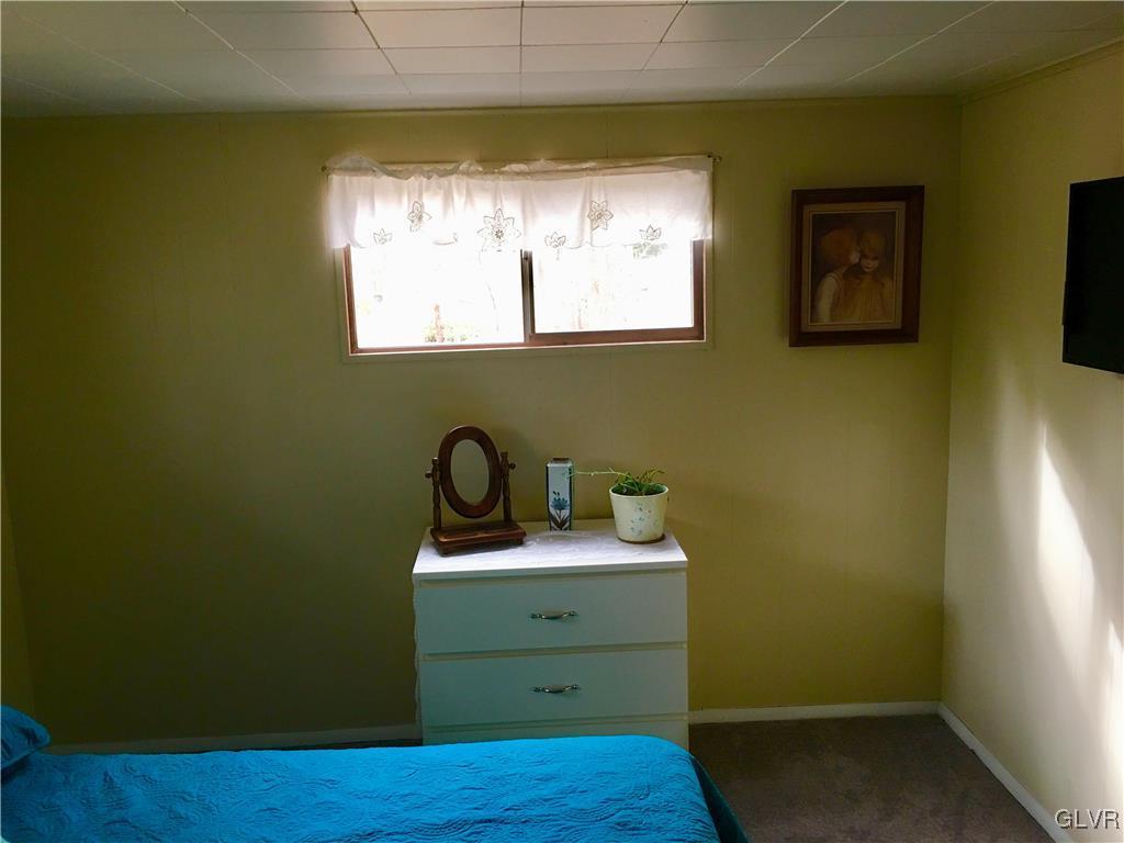 354 Tower Road Albrightsville, PA 18210 - Photo 18 of 26 a view of a bathroom with a sink and a window