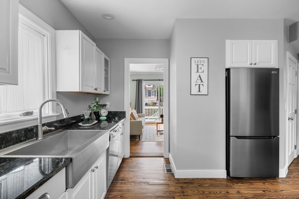 8 Baker Avenue Beverly, MA 01915 - Photo 7 of 40 a kitchen with a sink appliances and cabinets