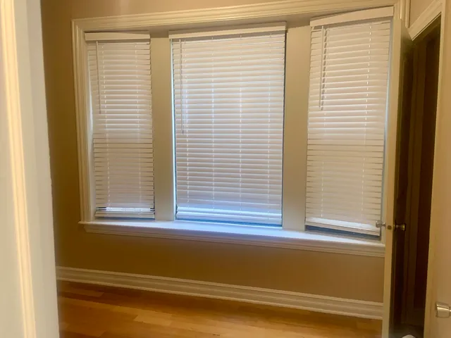 a view of a window and a bathtub