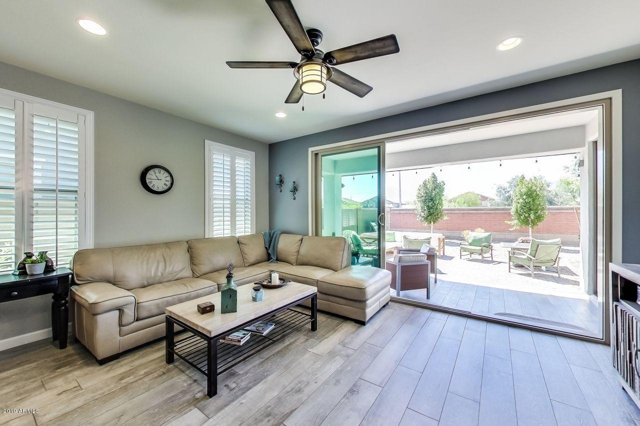 14353 West Wethersfield Road Surprise, AZ 85379 - Photo 3 of 35 Living Room 2