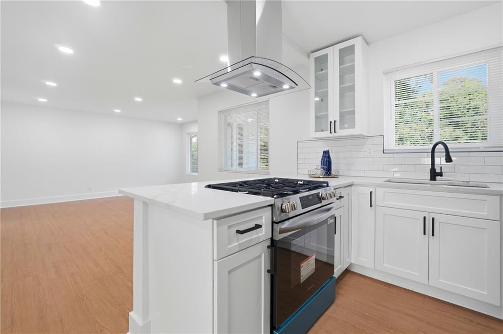 2118 Glendale Drive Decatur, GA 30032 - Photo 10 of 23 a kitchen with a stove and a sink