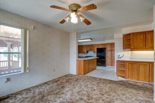 a kitchen with a sink and a window