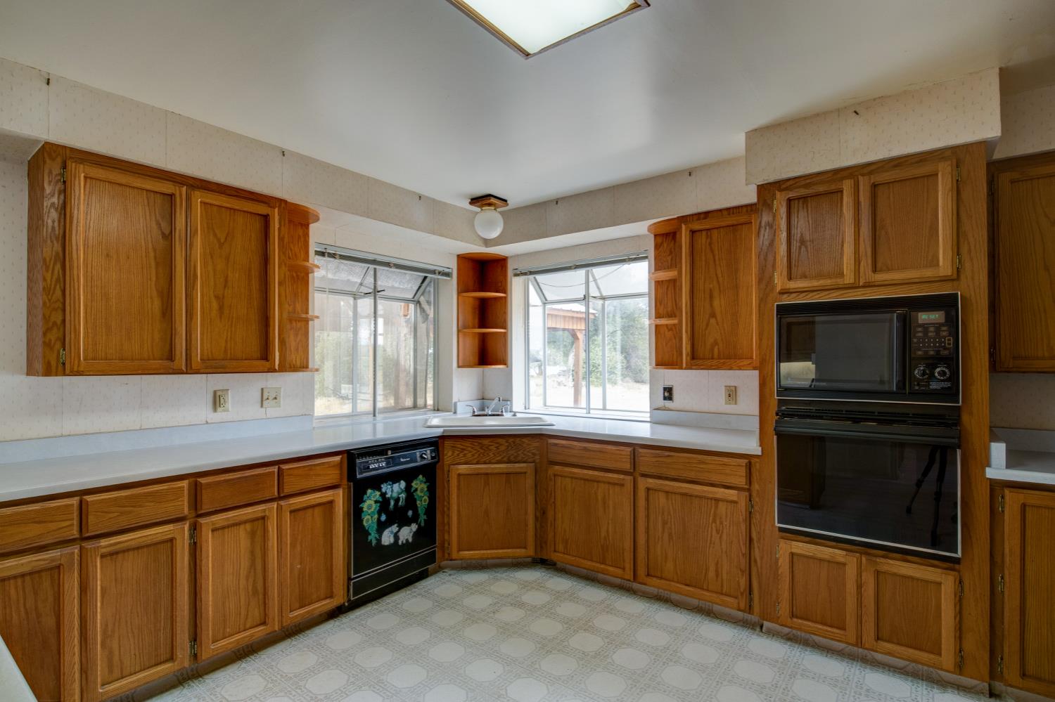 11120 Courier Road Plymouth, CA 95669 - Photo 14 of 73 a kitchen with stainless steel appliances granite countertop a sink stove and refrigerator