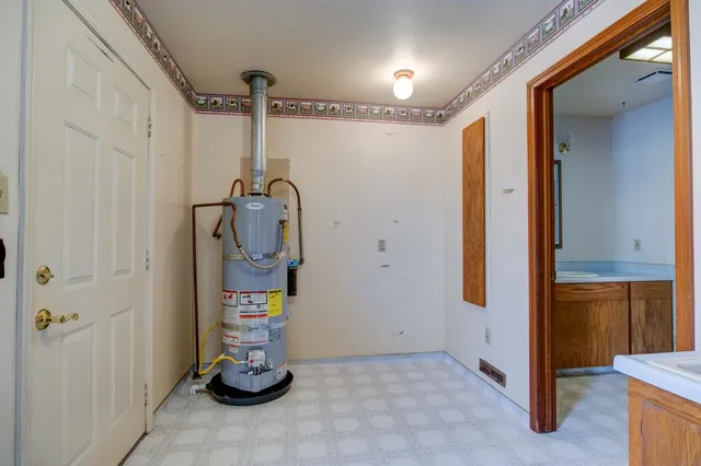 a view of empty room with windows