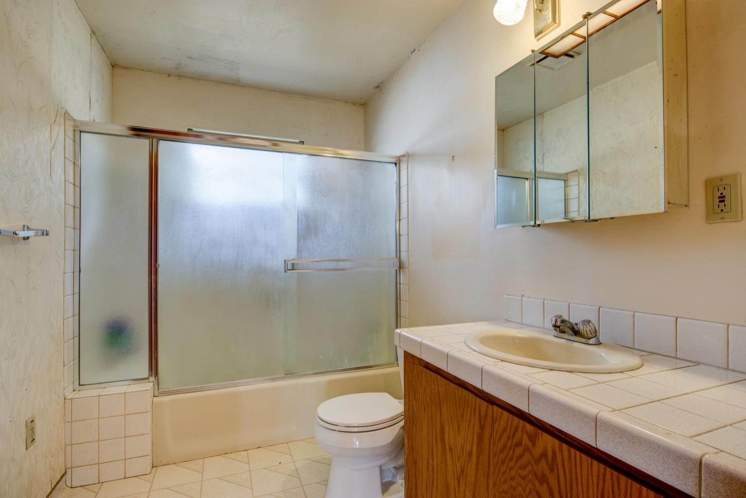 11120 Courier Road Plymouth, CA 95669 - Photo 23 of 73 a bathroom with a sink toilet and shower