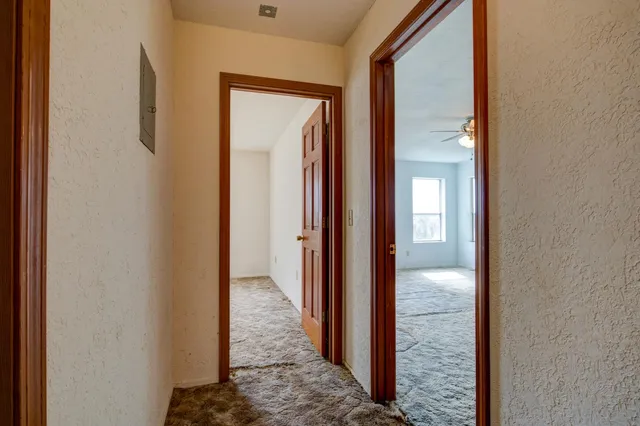 a house with swimming pool in front of it