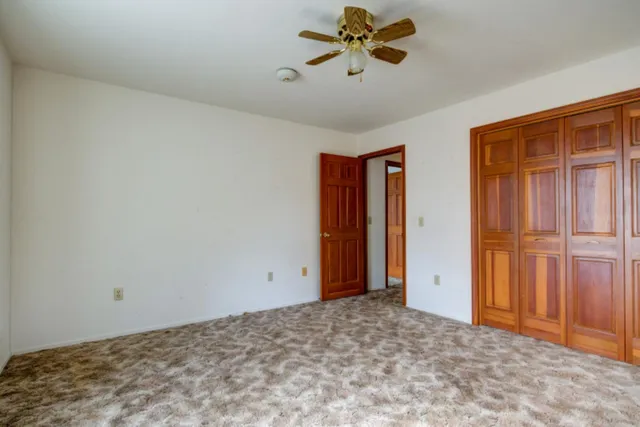 a view of a back yard of a house