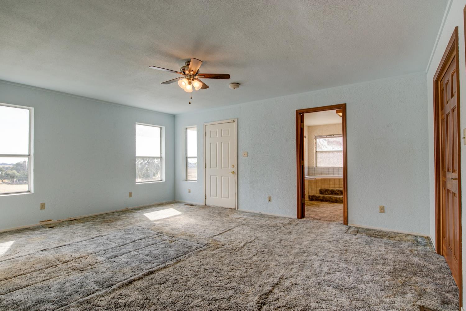 11120 Courier Road Plymouth, CA 95669 - Photo 27 of 73 a view of an empty room with a window