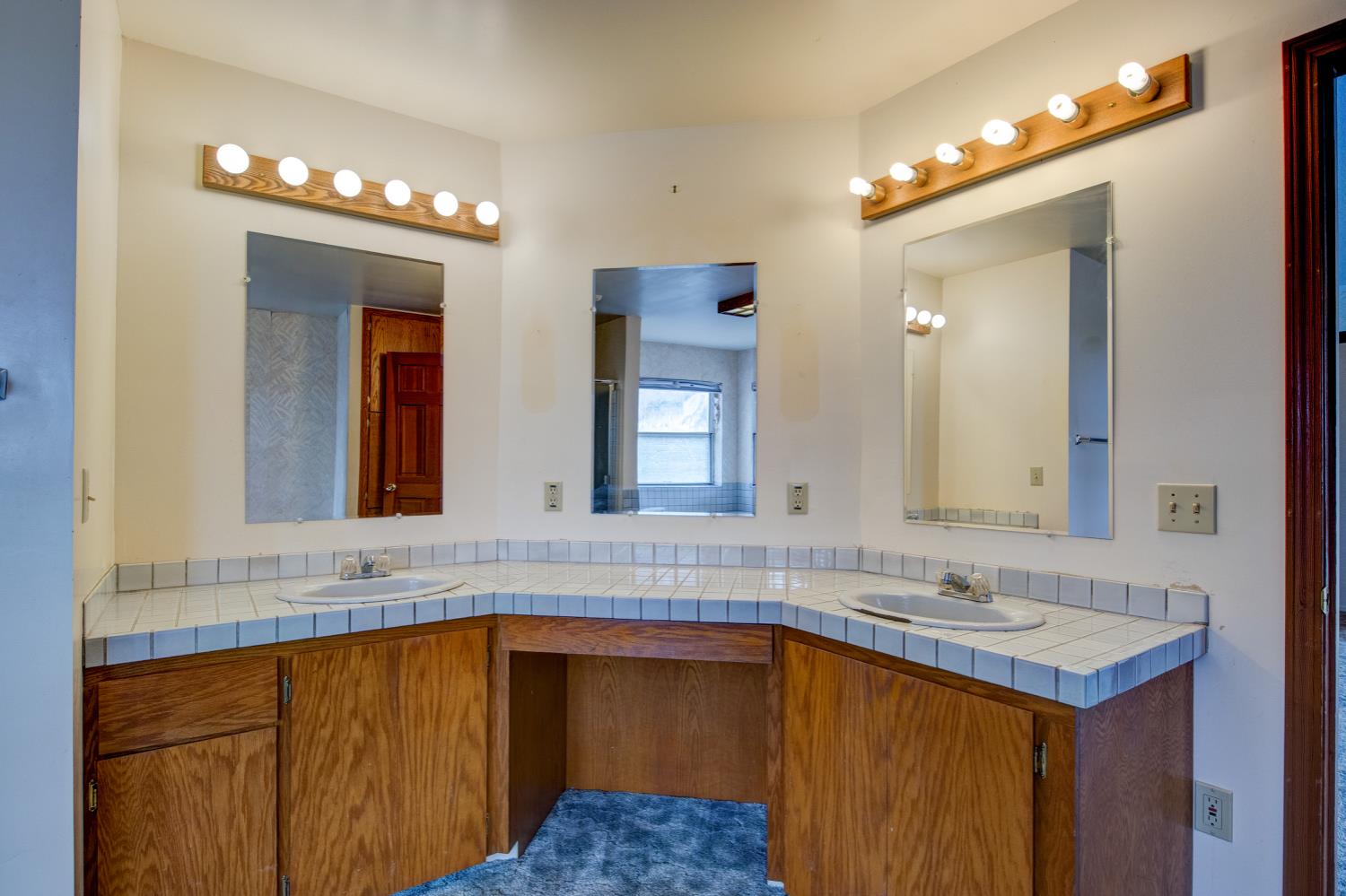 11120 Courier Road Plymouth, CA 95669 - Photo 31 of 73 a bathroom with a sink vanity and a mirror