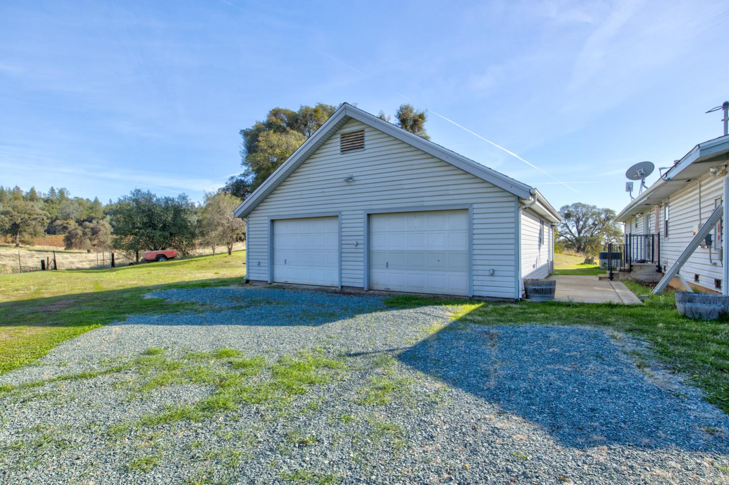11120 Courier Road Plymouth, CA 95669 - Photo 33 of 73 a view of a house with backyard and garden