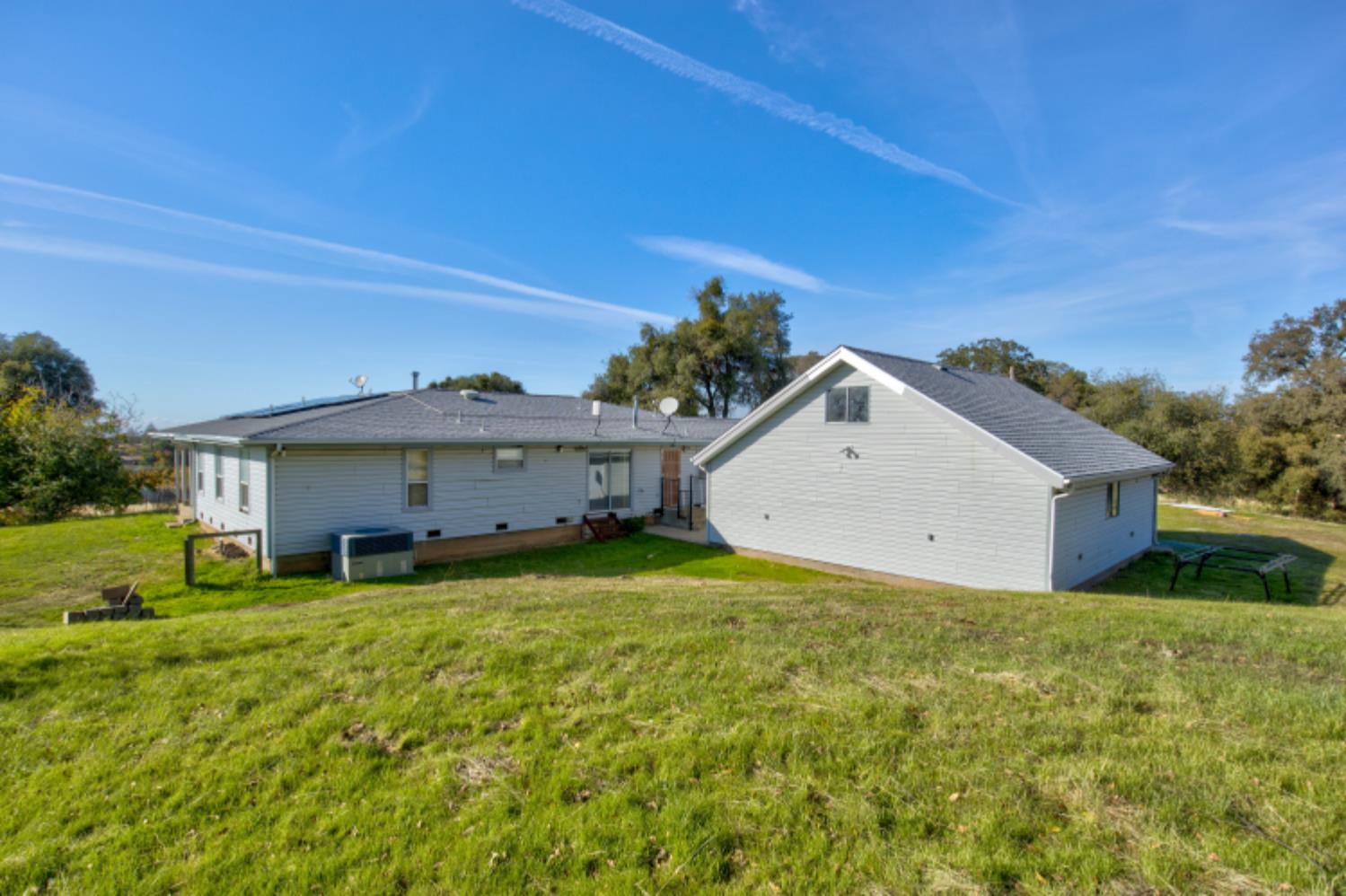 11120 Courier Road Plymouth, CA 95669 - Photo 37 of 73 a view of a house with a yard
