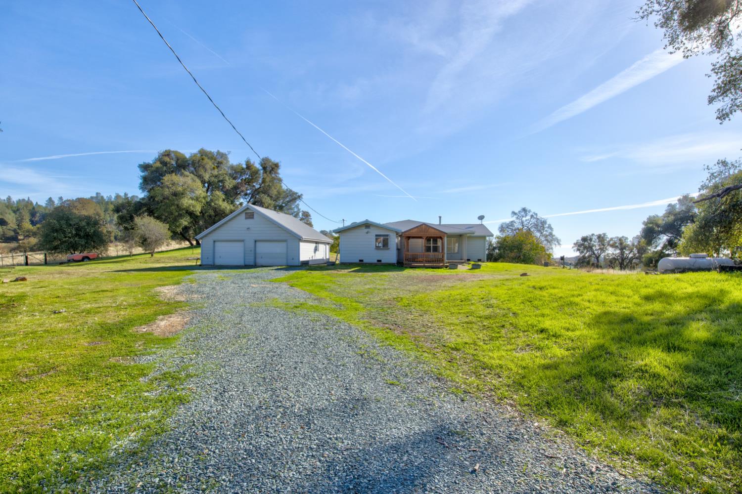 11120 Courier Road Plymouth, CA 95669 - Photo 4 of 73 a house view with swimming pool in front of it