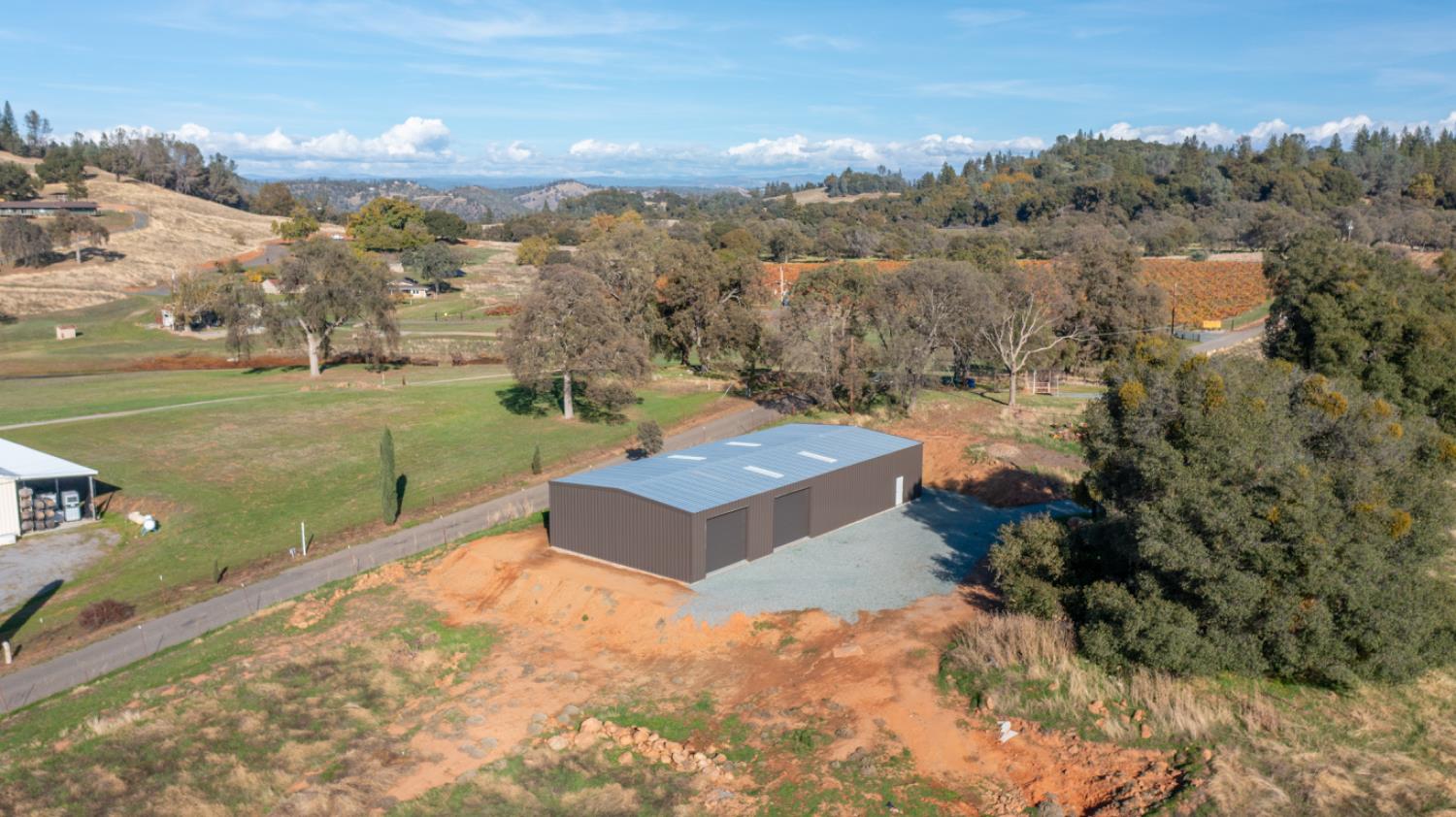 11120 Courier Road Plymouth, CA 95669 - Photo 63 of 73 a view of a terrace with yard and mountain view in back