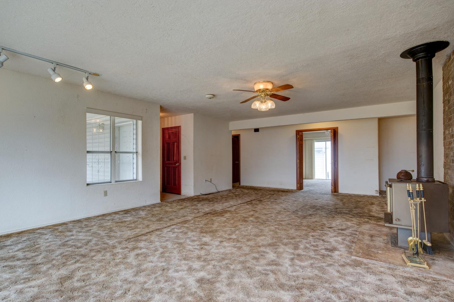 11120 Courier Road Plymouth, CA 95669 - Photo 8 of 73 a view of a room with gym equipment and a window