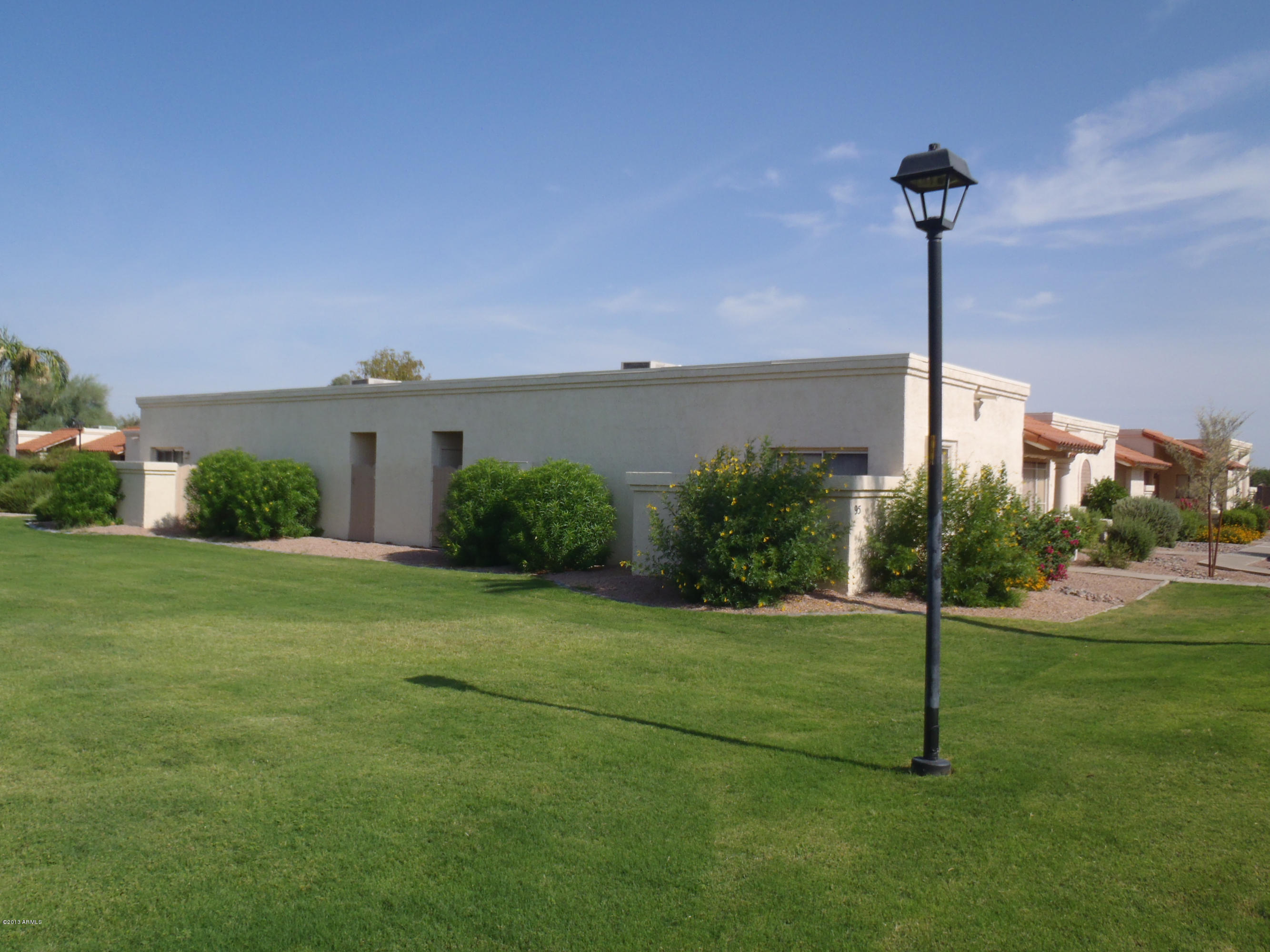 95 North Cooper Road, Unit 45 Chandler, AZ 85225 - Photo 21 of 26 a house view with a garden space