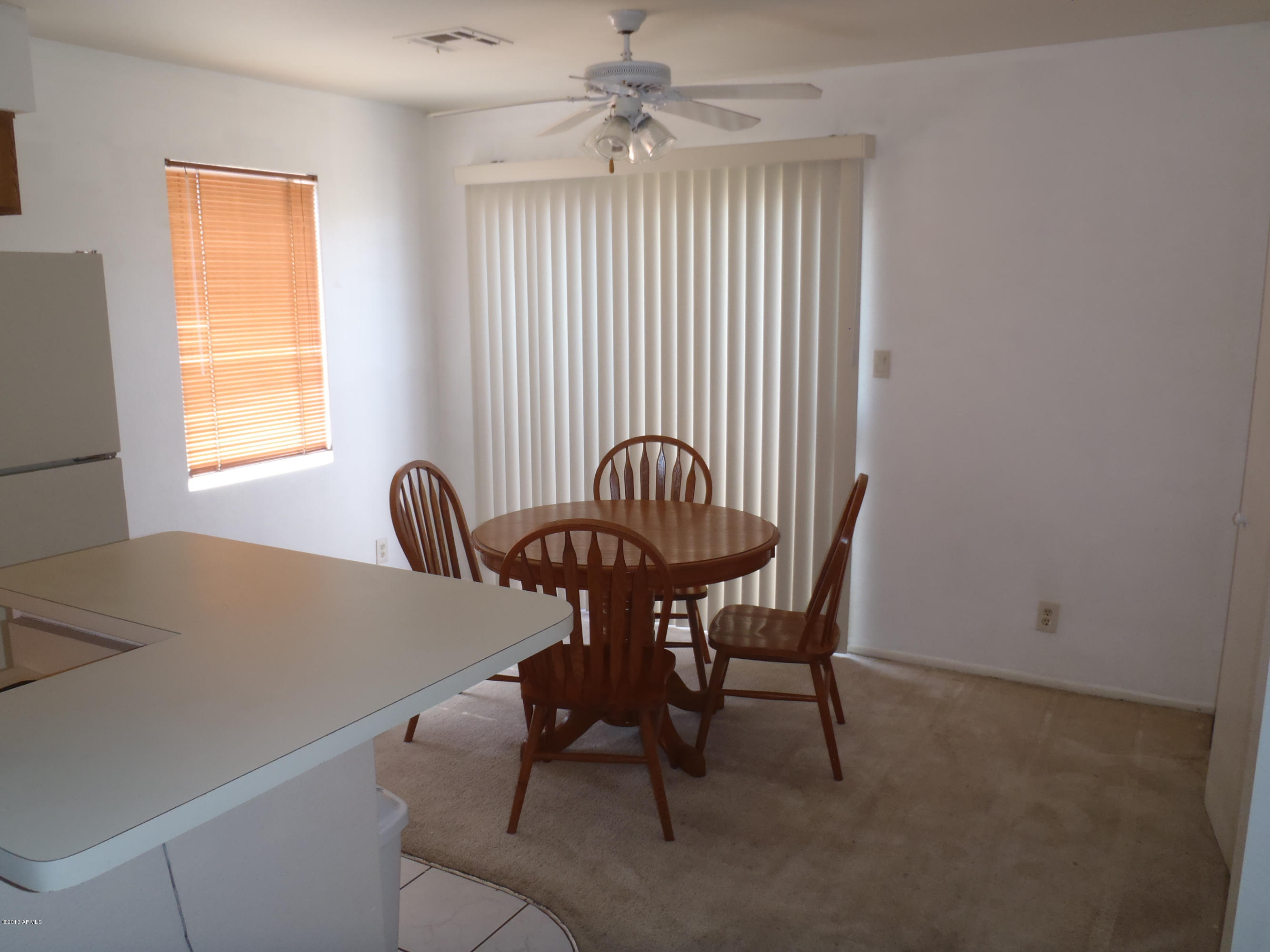 95 North Cooper Road, Unit 45 Chandler, AZ 85225 - Photo 4 of 26 a view of a workspace with furniture and window