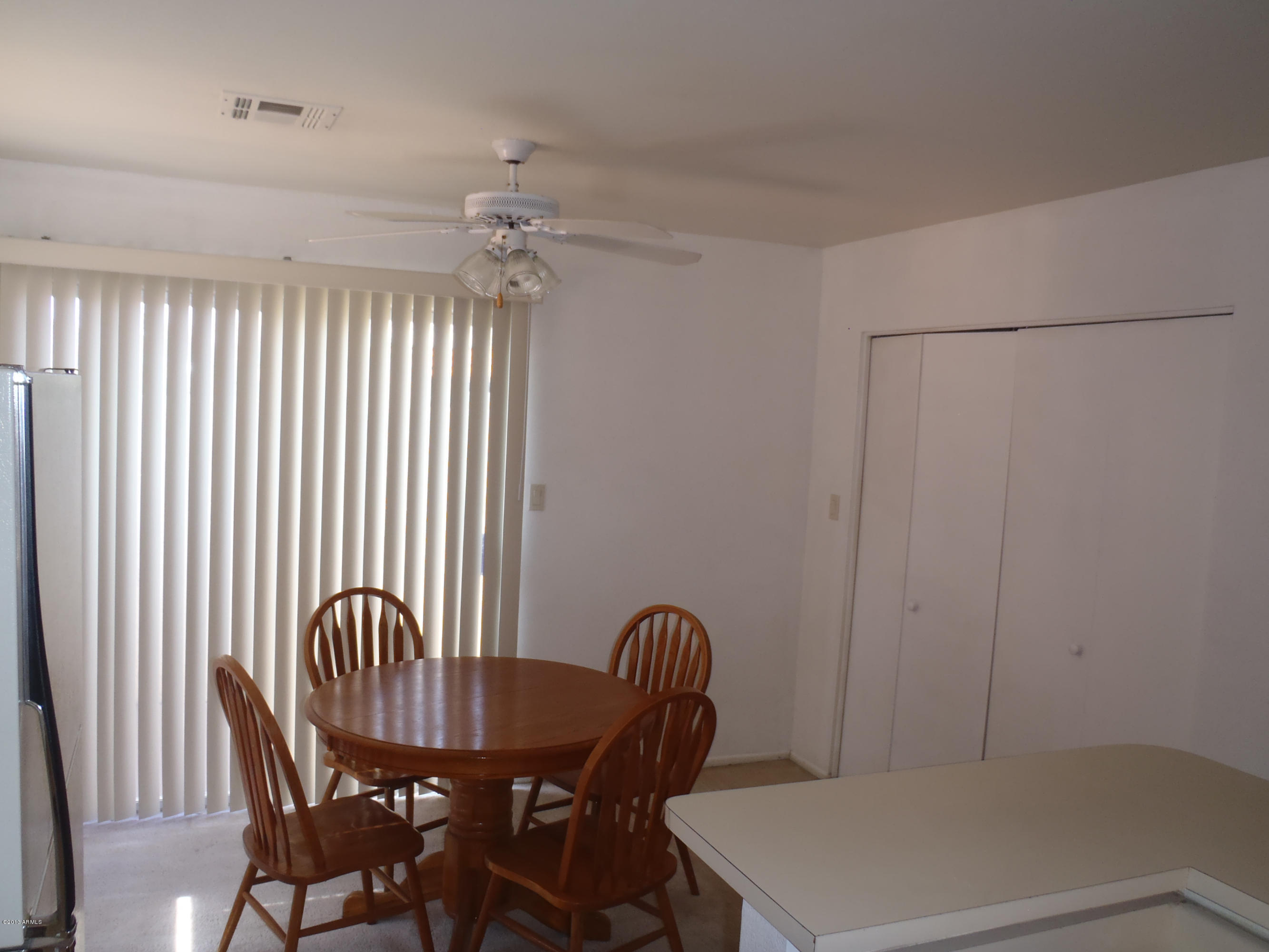 95 North Cooper Road, Unit 45 Chandler, AZ 85225 - Photo 5 of 26 a view of a dining room with furniture