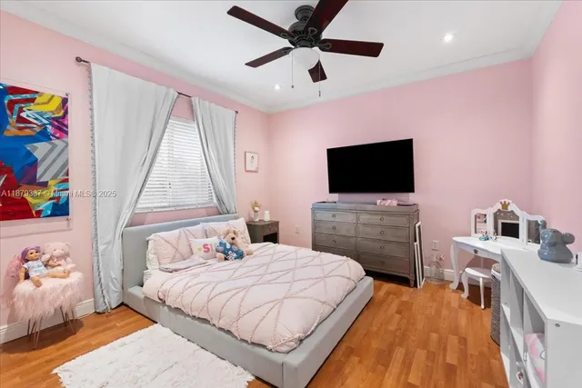 a bathroom with a sink a mirror a toilet and a mirror