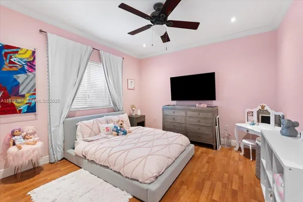 a bathroom with a sink a mirror a toilet and a mirror