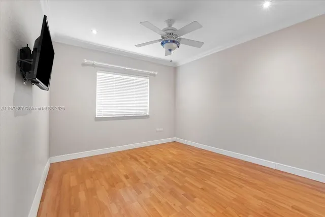 a bathroom with a double vanity sink a mirror and a shower