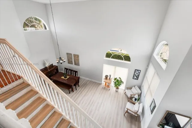 an aerial view of houses with outdoor space