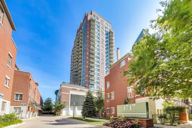 a view of a city with tall buildings