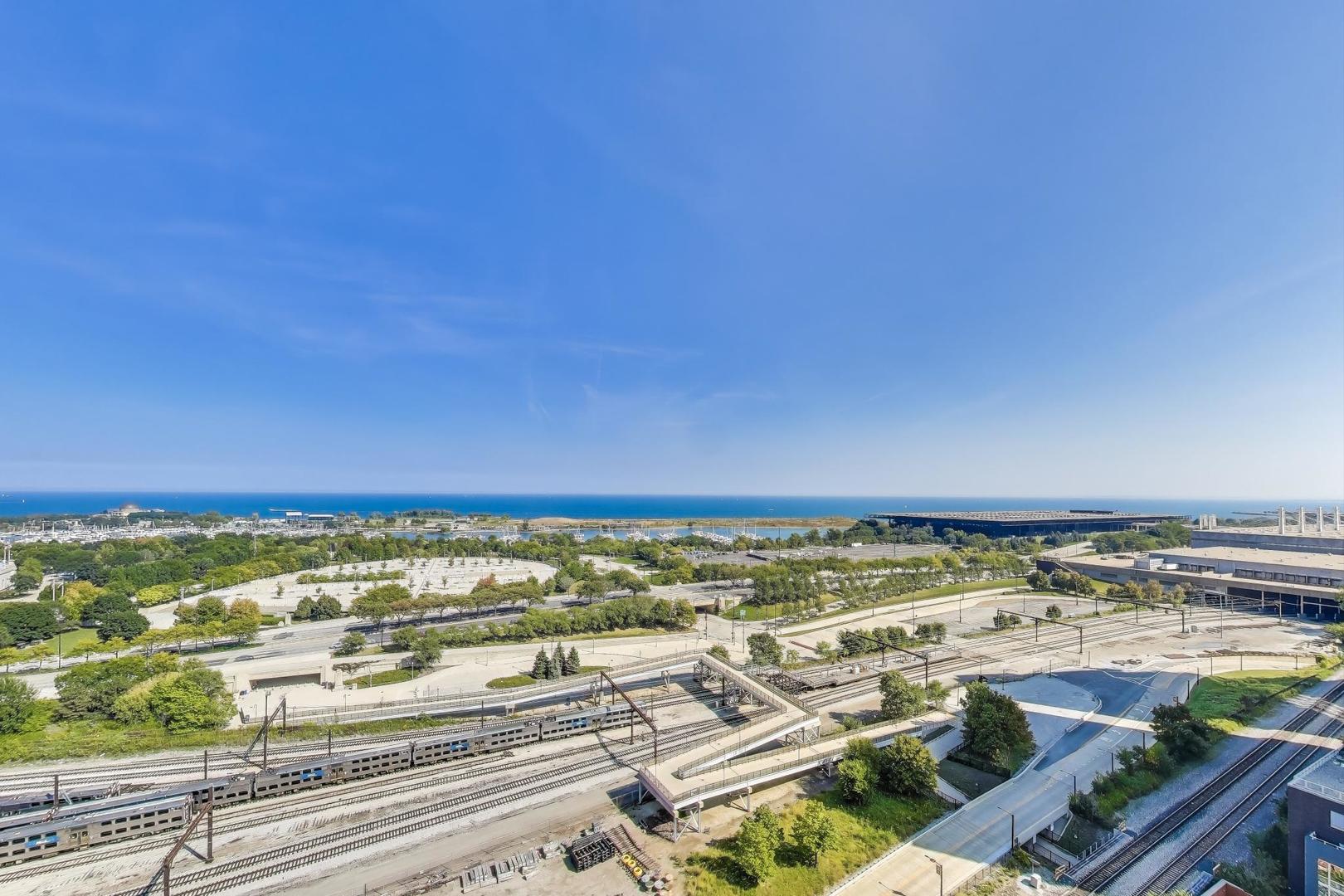 1717 South Prairie Avenue, Unit 1910 Chicago, IL 60616 - Photo 13 of 48 a view of an ocean and a city