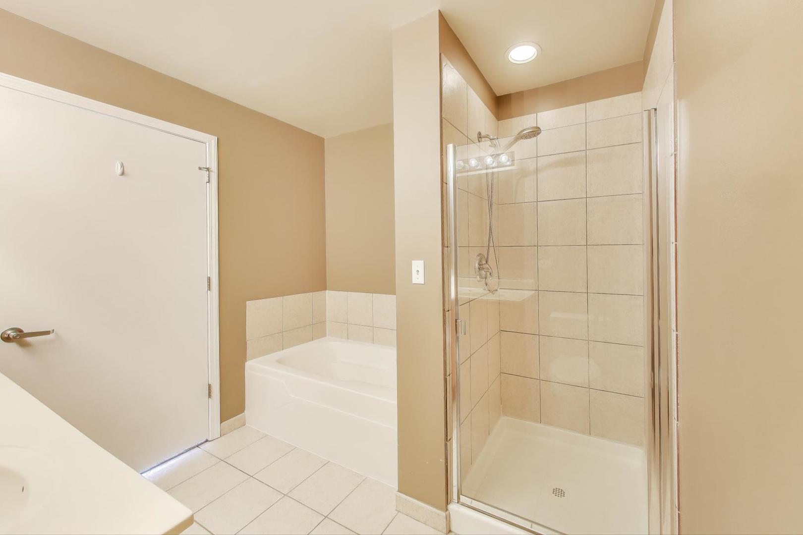 1717 South Prairie Avenue, Unit 1910 Chicago, IL 60616 - Photo 20 of 48 a bathroom with a shower and a sink