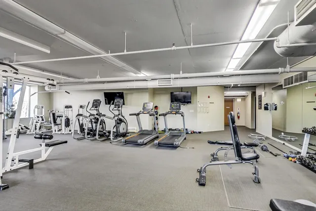 a view of a room with gym equipment