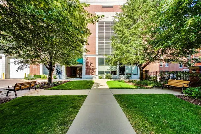 a view of swimming pool with sitting area and garden