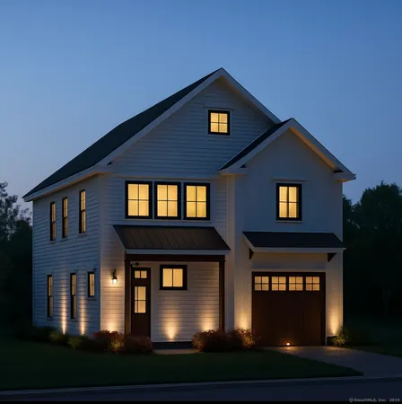 a front view of a house with yard and parking
