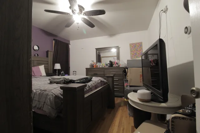 a kitchen with a stove sink and refrigerator