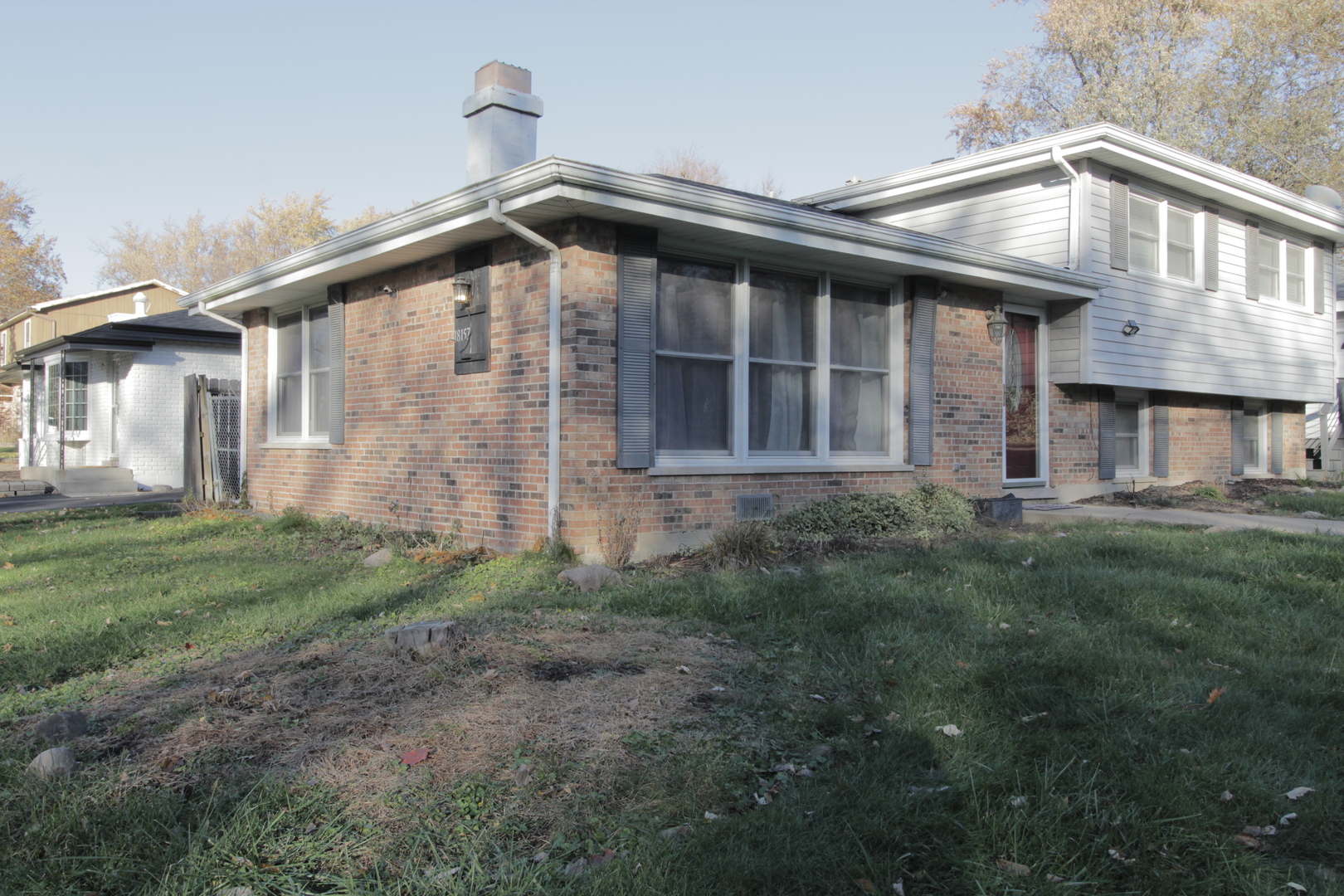 18157 Rockwell Avenue Homewood, IL 60430 - Photo 19 of 21 a front view of a house with garden