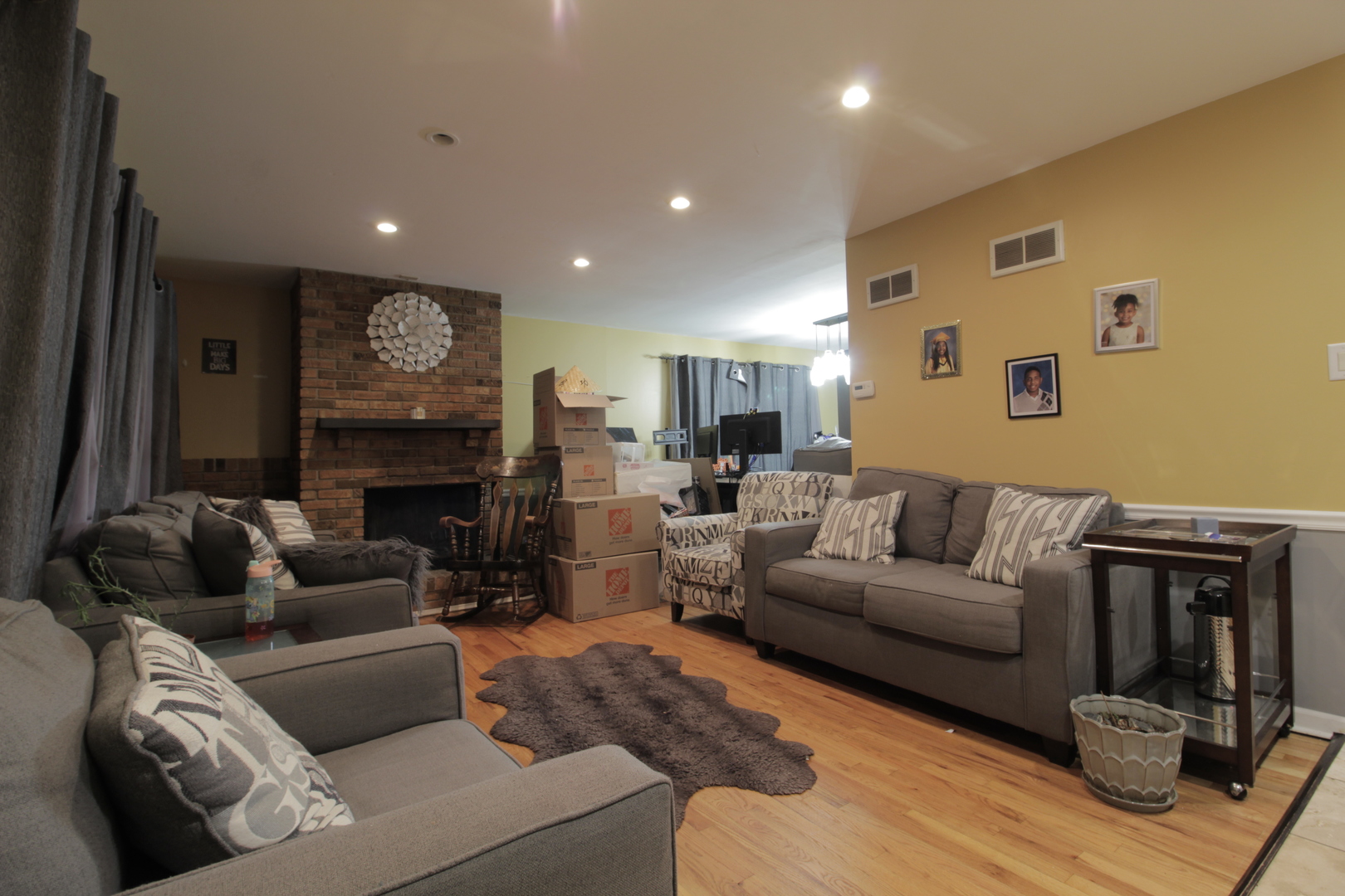 18157 Rockwell Avenue Homewood, IL 60430 - Photo 3 of 21 a living room with furniture and a fireplace