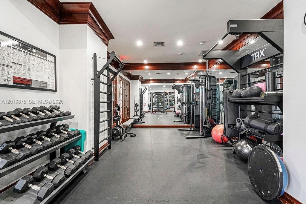 8925 Collins Avenue, Unit 12D Surfside, FL 33154 - Photo 22 of 35 a view of a room with gym equipment