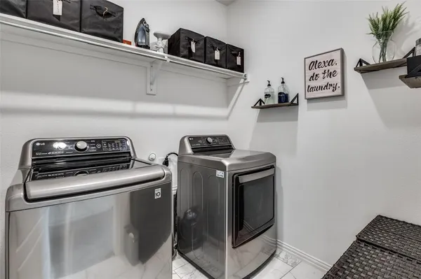 a balcony with furniture and city view