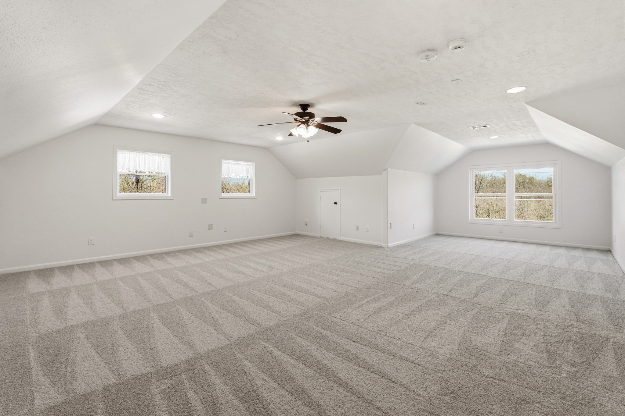 41712 Harpers Church Road Hempstead, TX 77445 - Photo 41 of 50 an empty room with a ceiling fan and window