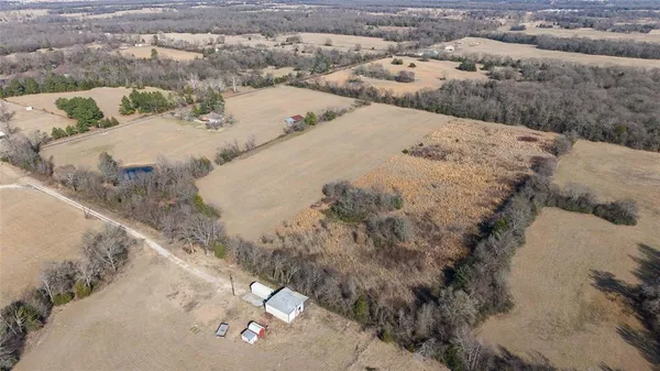 a view of lake with green space