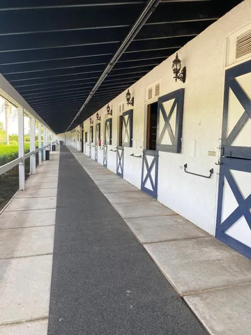 a view of a backyard with a barn