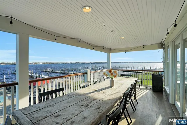 an outdoor view from balcony with seating space