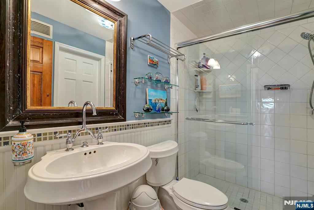 599 Point Avenue Brick, NJ 08724 - Photo 31 of 48 a bathroom with a sink toilet and shower